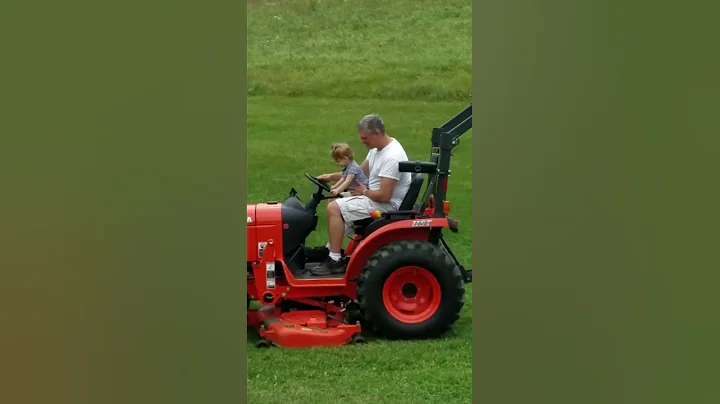 They grow up so quickly.. (driving a tractor)