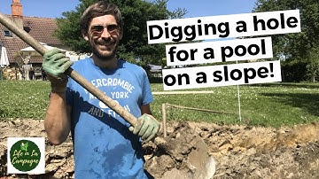 Digging a hole for a pool on a slope (Part 1 of installing an above ground pool with deck area)