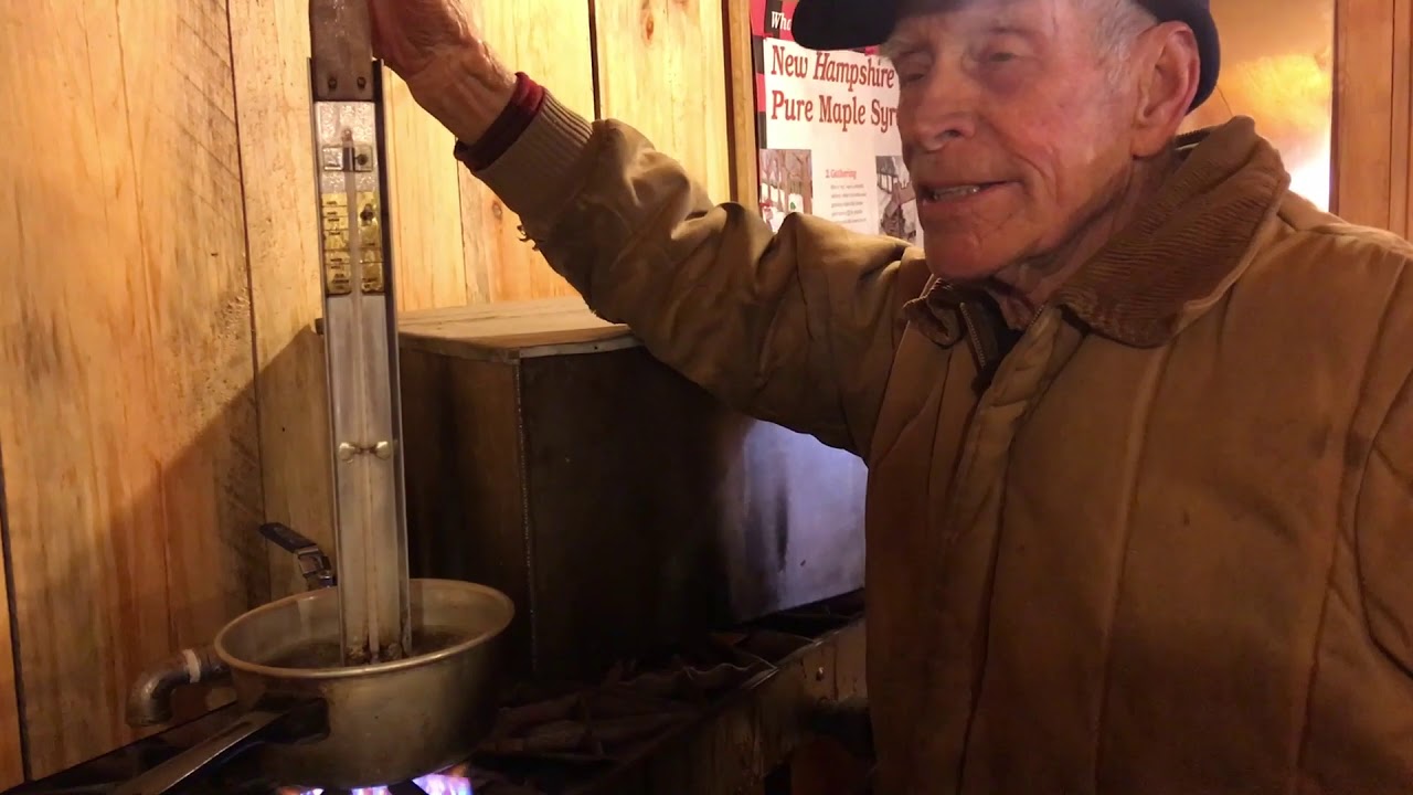 Sugarmaker calculates point of syrup the old school way—by temperature