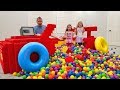 Filling Our GIANT Lego Race Car With 10,000 BALL PIT BALLS! Lost Dad's Phone!