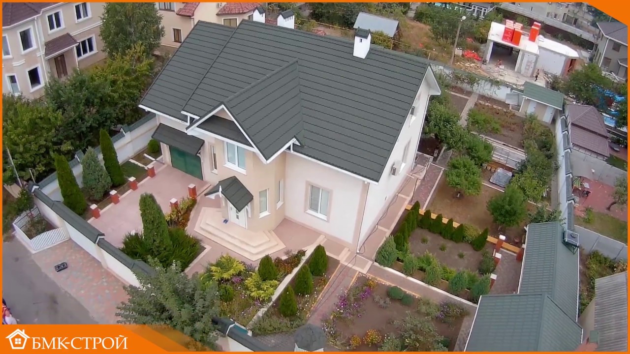 Укладка композитной черепицы и установка водостока. Объект БМК-СТРОЙ ...