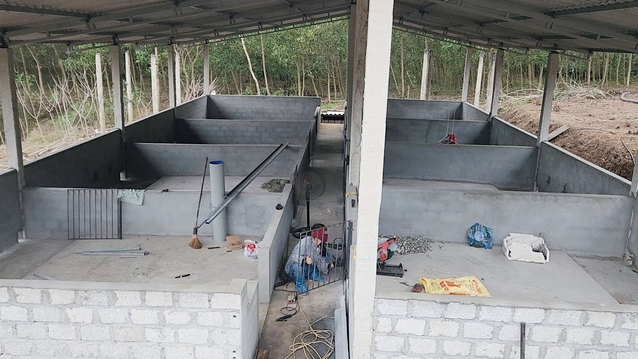 Welding iron doors for pig barns