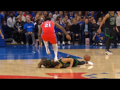 Joel Embiid accidentally steps on Grant Williams head and his face slams into the ground