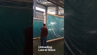 How to load and unload the glass panels from container?