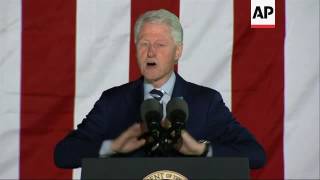 Bill and Chelsea Clinton rally supporters