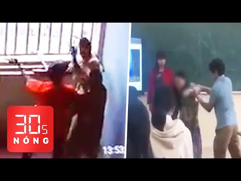 Video Bản tin 30s Nóng: Nhân viên quản lý thị trường đánh... - youtube