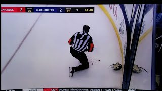 NHL Referee Garrett Rank left bloody after high stick to the mouth screenshot 3