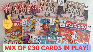 A £30 mix of scratch cards, £30 of £5, £3, £2 and £1 scratch cards.