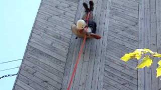 Rappelling upside down Woodruff Scout Reservation