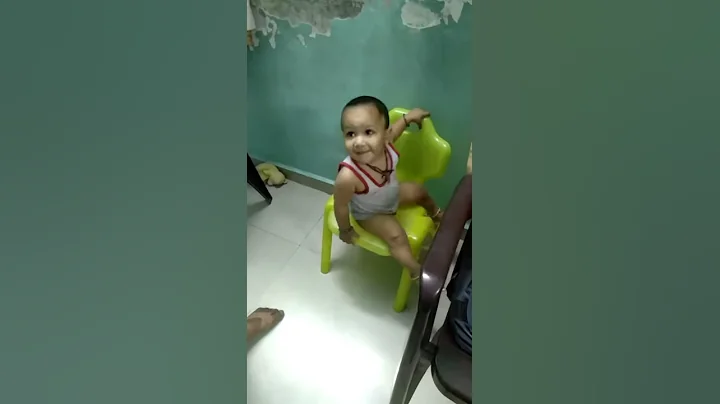 Aradhy Climbing the chair for the first time 5-6-1...