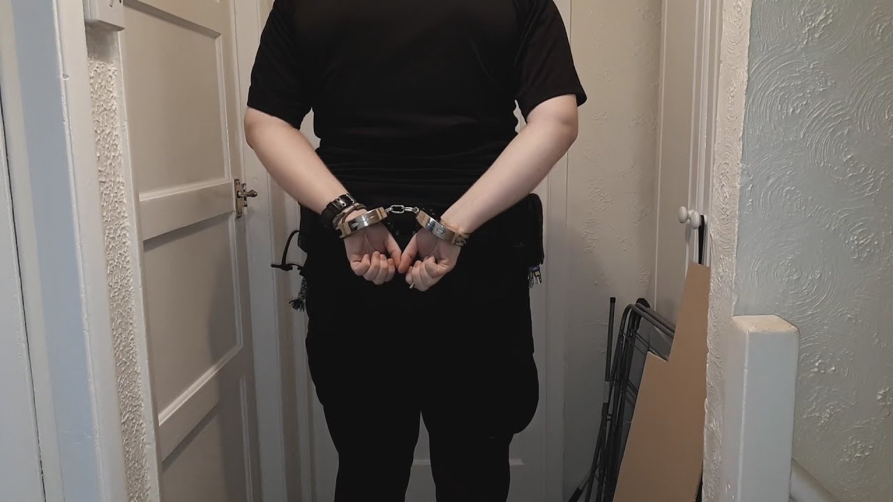 photo Blunt In Handcuffs clejuso model 13 heavy duty handcuffs view behind back also