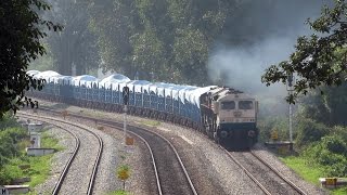 Smoking Electromotive Diesels lead a Blue BOXN Rake - Indian Railways