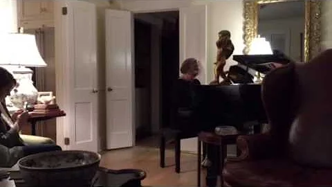 Kathryn Holbrook playing a Christmas carol