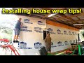 Installing house wrap vapor barrier shop build episode 2