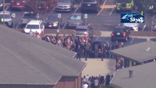 Funeral held for 3 killed in crash, including Greenville police officer