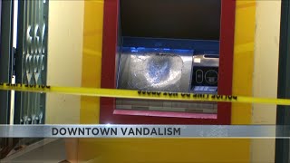 Three suspects arrested for vandalizing two banks in Downtown Tucson