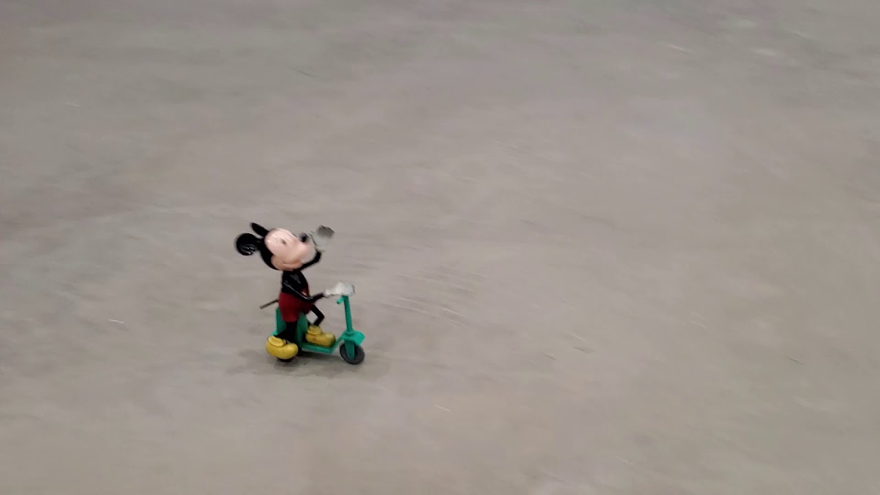 Mickey Mouse Scooter windup toy.