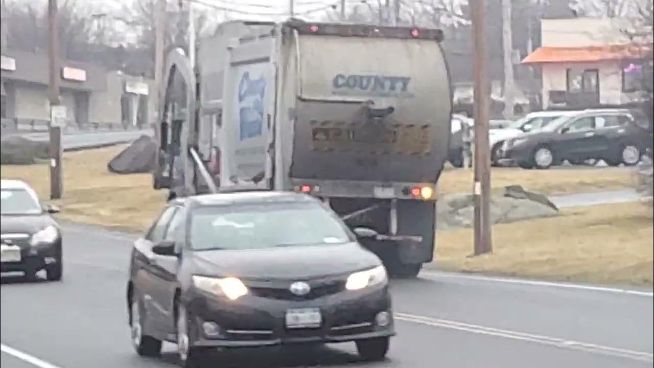 County Waste Garbage Disposal Mack Mcneilus front loader 984 with a