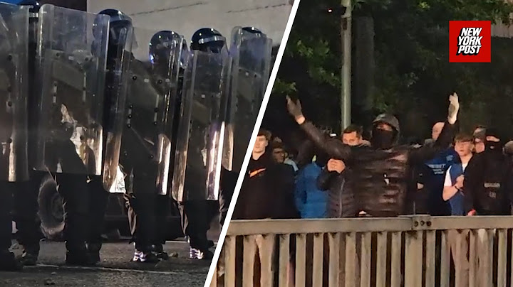 Police clash with anti-immigration protesters in Northern Ireland