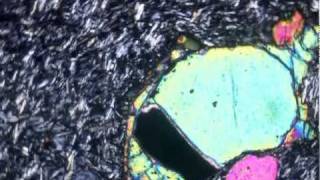 Olivine in basalt (XPL)