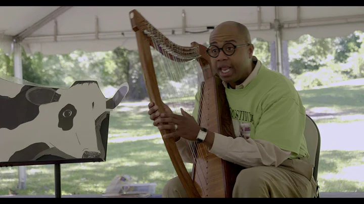 Dr. Reginald Houze plays the Harp with Literacy Le...