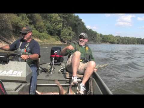 Flying silver carp jump and leap out of the water and into our boat. Indiana Outdoor Adventure TV hosts Troy McCormick and Mac Spainhour fend off the 20 poun...