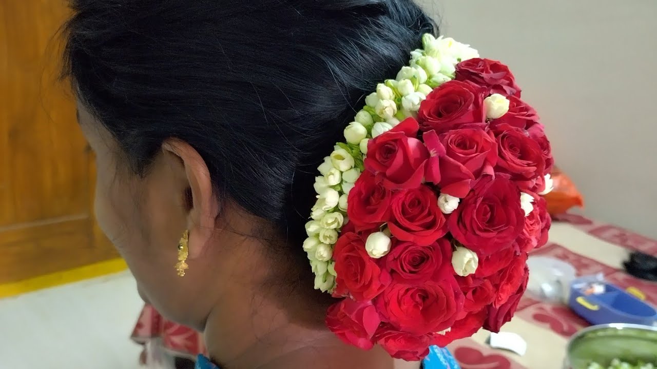 pink roses bun hairstyle - Shaadiwish