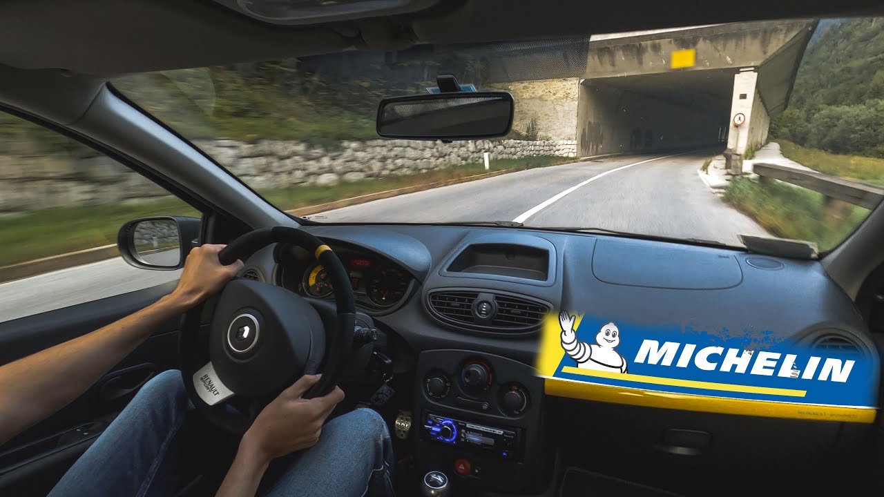 Renault Clio RS 2010 POV drives between mountains