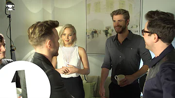 Jennifer Lawrence meets Olly Murs. He awkwardly "flirts" *CRINGE*