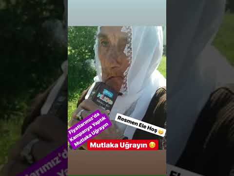 Çikolatalı süt içen teyze halinden memnun gibi görünüyor