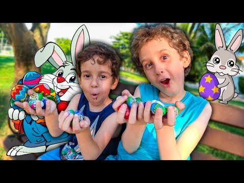 KIDS HUNTING EASTER EGGS IN THE PLAYGROUND