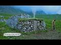 Building Bushcraft Stone Shelter in the Mountain with Grass Roof & Cozy Fireplace