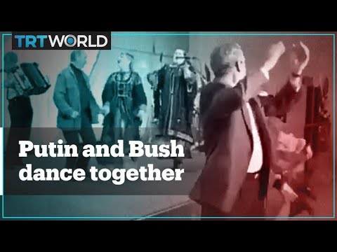 Archive footage shows Putin and Bush dancing together