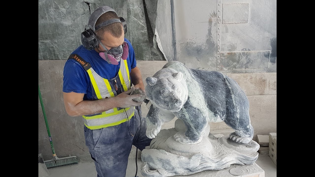 CARVING A 1000 Pound STONE into a GRIZZLY BEAR