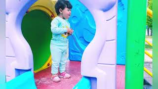 cutebaby dancing in the park playing