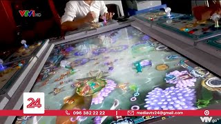 Máy bắn cá náo loạn vùng biên | VTV24 screenshot 2