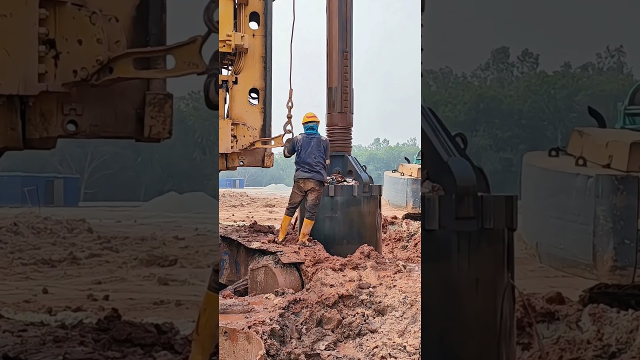 Watch Rotary Rig Unlock Double Bottom Bucket To Dump Pile Soil