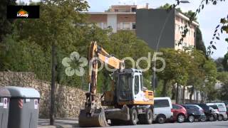 Excavator Parked Amog Other Cars - Royalty Free Music Footage and Sound Effects by MSVoy