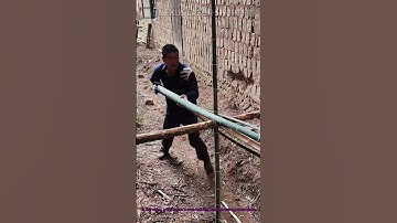 Traditional Bamboo Splitting with Cross Stake – Ancient Craftsmanship in Action