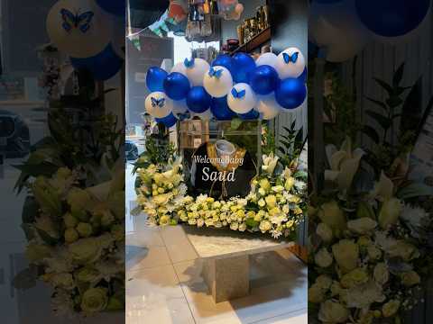 أجمل هديه مولودالدولاب مع طباعة عليه مع بشت مع طباعة اسم المولود مع ثوب مع قاعدة ورد طبيعي مولود