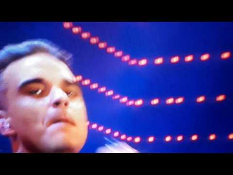 Video: Vim Li Cas Robbie Williams Tsis Kam Koom Nrog Kev Sib Tw Thaum Kaw Olympic