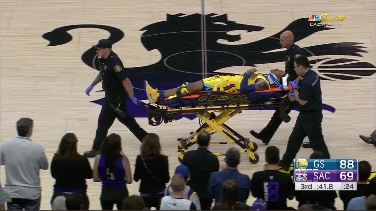 Warriors' Patrick McCaw leaves on stretcher after hard fall following a foul ...