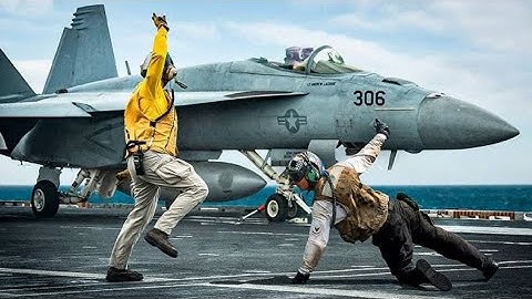The Insane Hand Signals on an Aircraft Carrier Flight Deck Explained