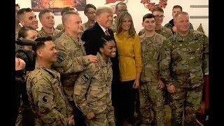 Donald and Melania Trump make surprise visit to US troops in Iraq