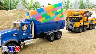 Построить дом грузовик автокран. видео для детей