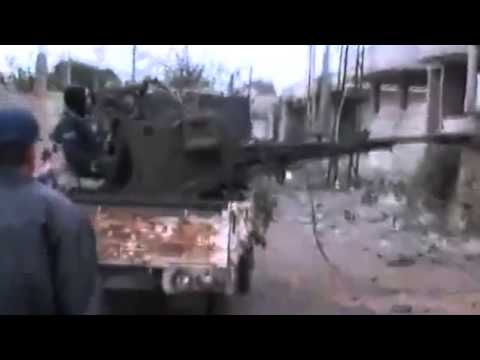 ضرب تجمع الشبيحة بمدفع رشاش عيار 23 بصر الحرير 6 1 2013