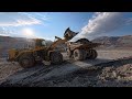 Working With Big Komatsu WA900-8 Wheel Loader Loading Haul Truck With Heavy Mud