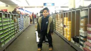 Derek E. dancing at DSW store