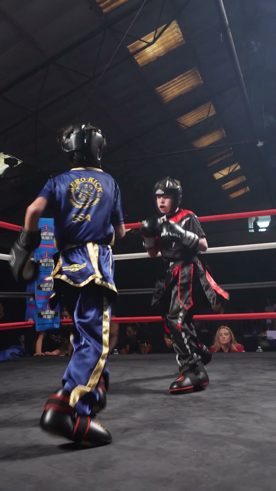 Young Kickboxers having an intense fight on Battle of Knights.