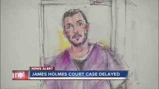 Aurora theater shooting suspect's hearing delayed over injury